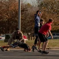 Participants doing push-ups at a battle station